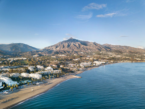 Marbella beach and the Sierra Blanca mountains from the air